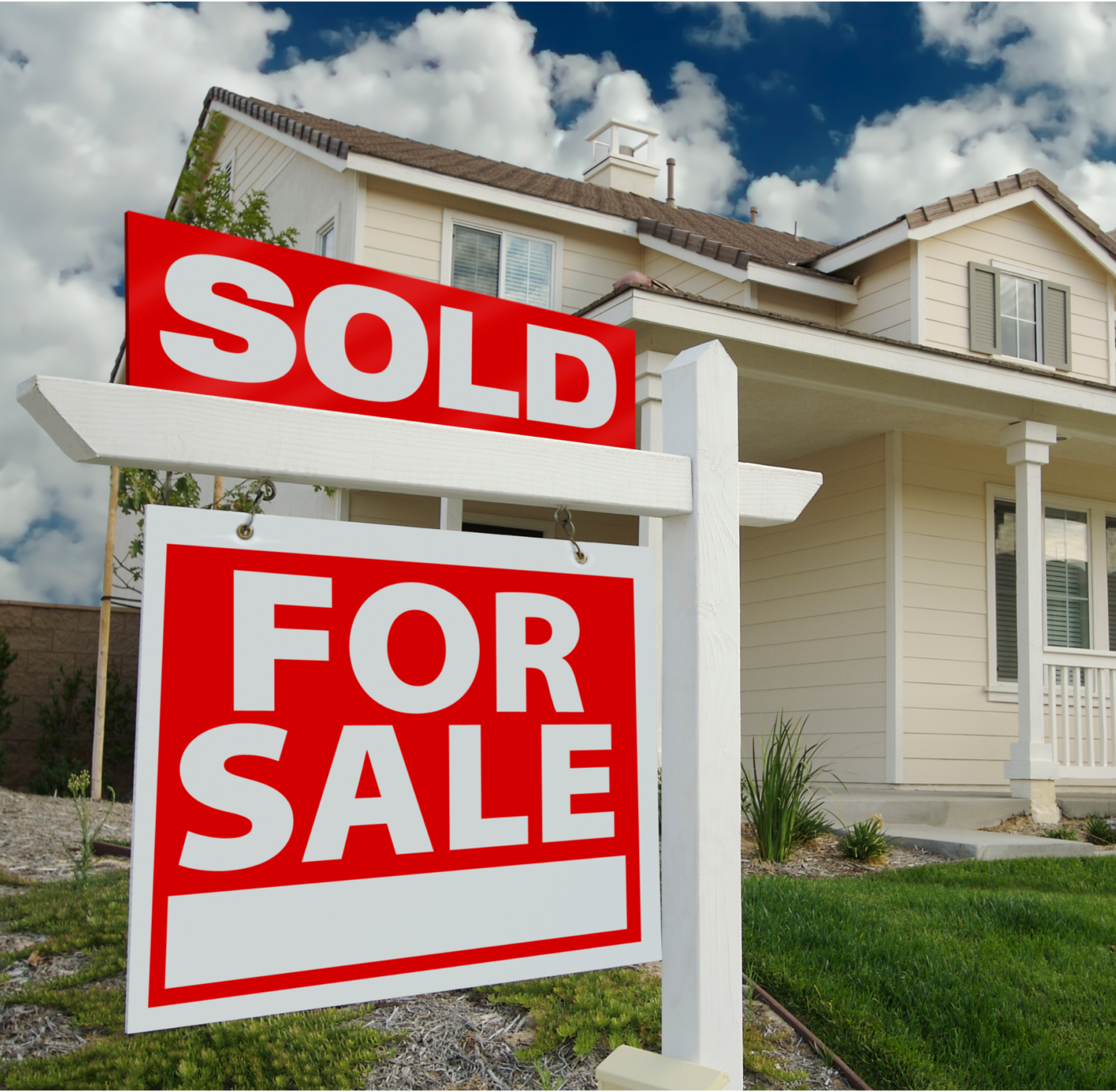 Two Story home with For Sale sign showing Sold out front.