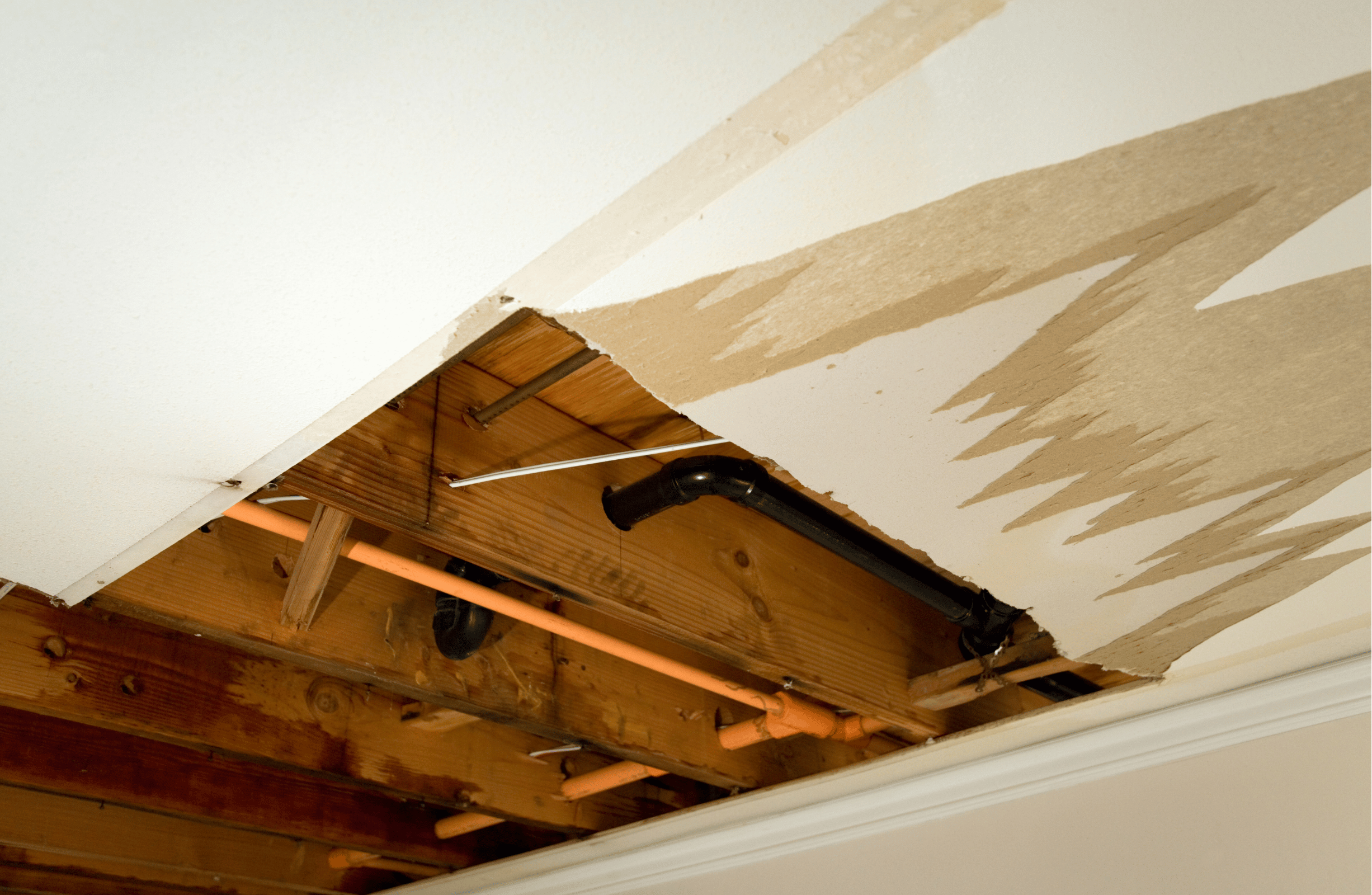 Cut out portion of ceiling dry wall due to water damage.